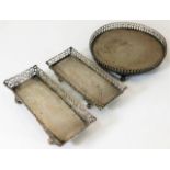 Three continental silver galleried trays, probably