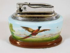 A Minton hand painted Ronson table lighter with pheasant decor signed T. Lee