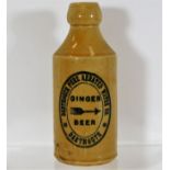 A Dartmouth ginger beer stoneware bottle