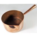 A French heavy gauge copper pan with decorative ha