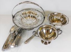 A silver plated antique bread basket twinned with