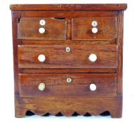 A c.1900 mahogany apprentice chest of drawers 9in