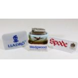 Three porcelain retail advertising plaques for Lla