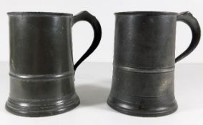 Two antique pewter quarts