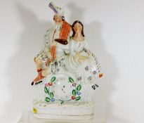 A Victorian Staffordshire clock figure group 14in