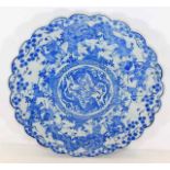 A late 19thC. Chinese blue & white charger with dr