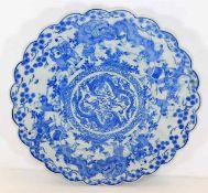 A late 19thC. Chinese blue & white charger with dr