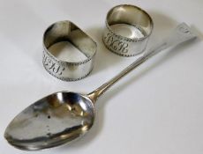A silver Georgian tablespoon & two inscribed napki