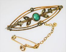 A 9ct gold brooch set with seed pearl & turquoise