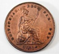 An 1854 penny with ornate trident UNC with lustre