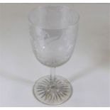 A Victorian wine glass with wheel cut foot & decor
