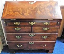 An 18thC. Georgian mahogany bureau with brass fitt