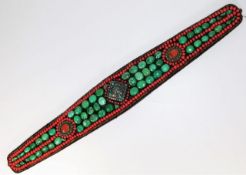 A Tibetan Buddhist belt decorated with turquoise,