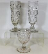A 19thC. glass footed highball twinned with one si