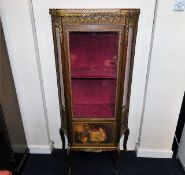 A 19thC. mahogany glazed display cabinet with appl