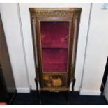 A 19thC. mahogany glazed display cabinet with appl