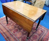 A 19thC. mahogany Pembroke table with flush fittin