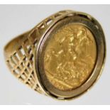 A 9ct gold half sovereign ring 8.3g size P/Q