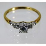 An art deco 18ct gold ring with platinum mount wit