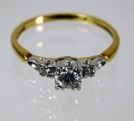 An art deco 18ct gold ring with platinum mount wit