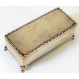 A robust silver footed box by Walker & Hall