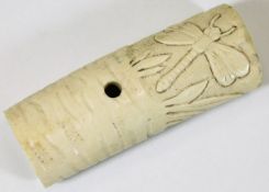 An Oriental carved bone handle, possibly from a ce