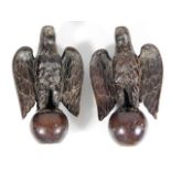 Two carved oak finials of eagles, minor faults