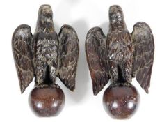 Two carved oak finials of eagles, minor faults