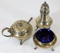 A silver cruet set by Herbert Edward Barker & Fran
