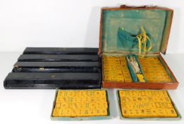 A Chinese c.1900 leather cased mahjong set with st
