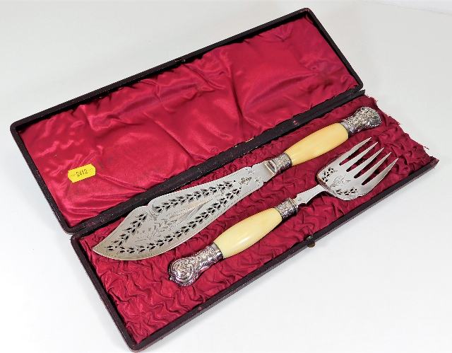 A Victorian boxed silver plated fish serving set w