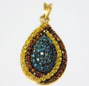 A 9ct gold pendant set with blue, canary & cinnamo