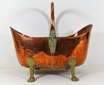 A decorative hammered copper & brass log bucket 18