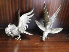 Two metal cockerel figures