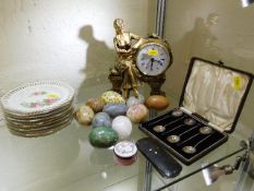 Nine polished stone eggs, an enamelled box & other