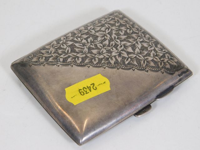 A silver cigarette case