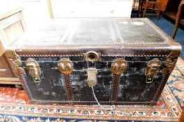 A large cabin trunk with key