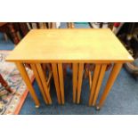 A teak nest of five tables