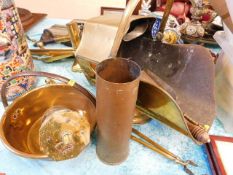 A 19thC. brass coal scuttle, a brass spit turner &