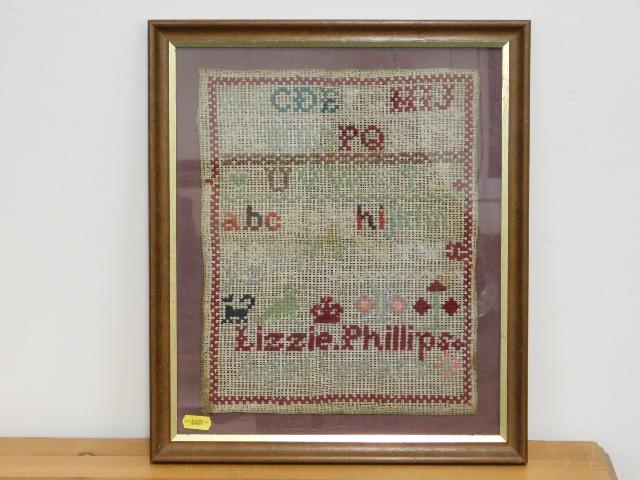 An antique alphabet sampler by Lizzie Phillips Age