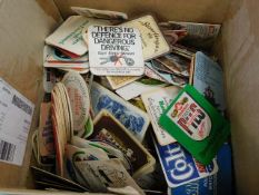 A boxed quantity of beer mats