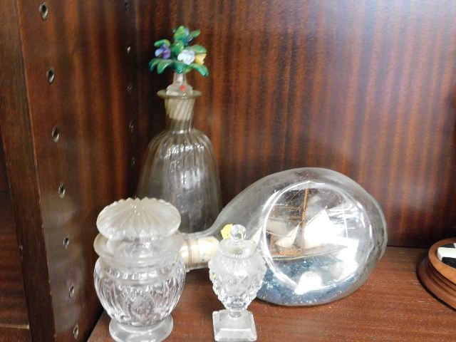 A ship in a Haig bottle, a decanter with floral gl