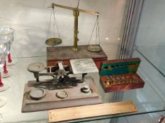 A set of 19thC. gold scales with boxed weights, a