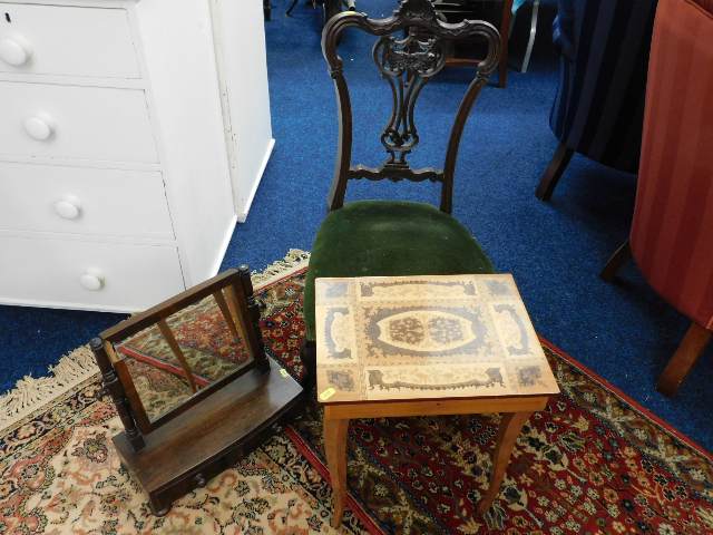 A small carved back chair, a dressing table mirror