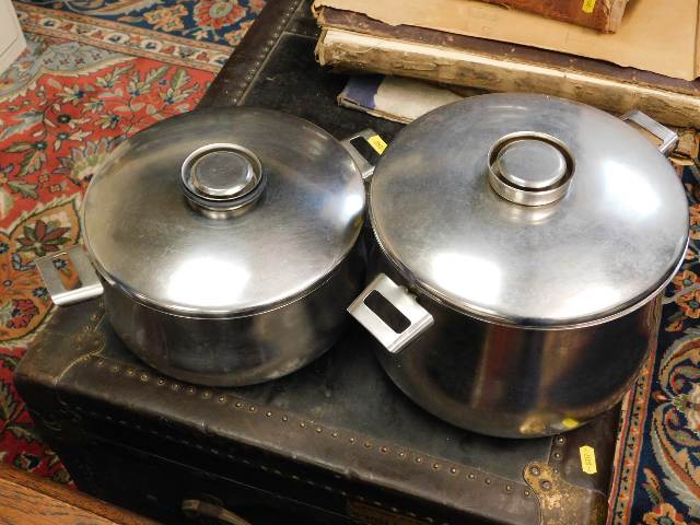 Two stainless steel cooking pots with lids