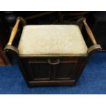 An Edwardian music stool with pull down compartmen