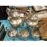 A five piece silver plated service