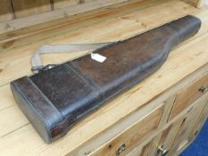 A vintage leather gun case