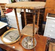 A two tiered bamboo table