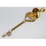 An 18ct gold key pendant set with citrine main sto